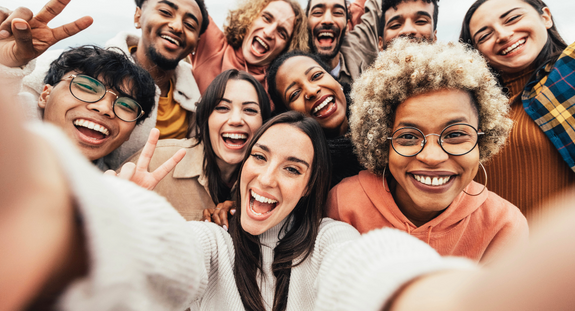 a person having a fun selfie with her friends