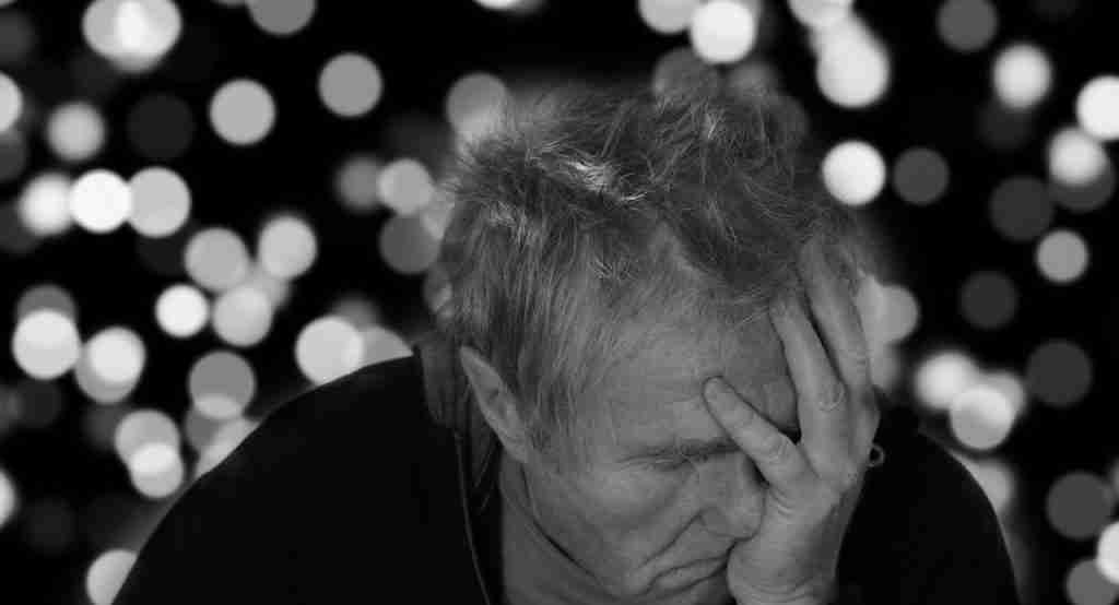 old man having mental breakdown