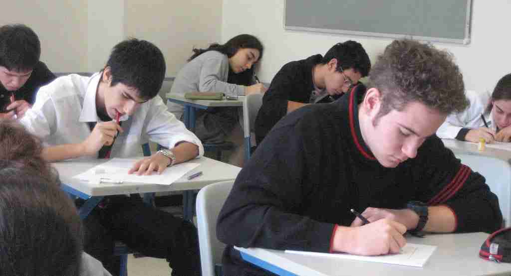 students tying to take an exam